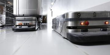 Hospital robots in a hallway - low-profile, autonomous mobile robots